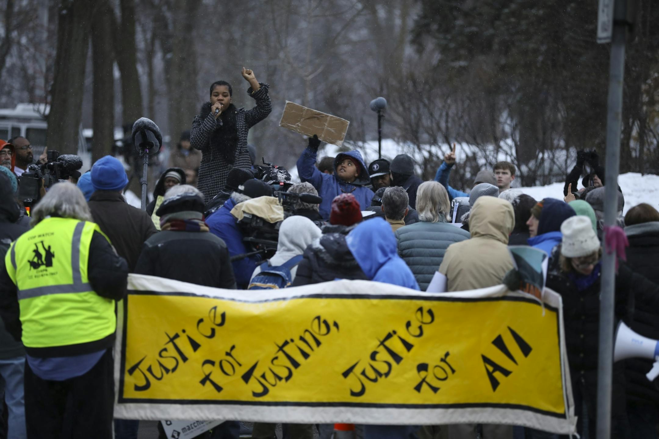 Leslie Badue, President of the NAACP Minneapolis Chapter, spoke to the crowd gathered for the rally Tuesday evening.