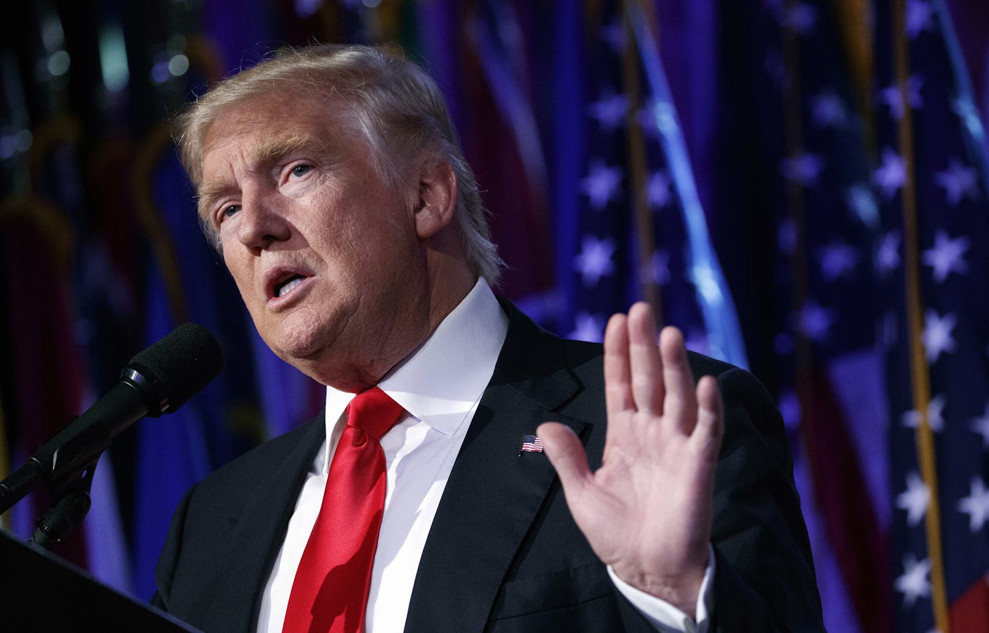 FILE - In this Nov. 9, 2016, file photo, President-elect Donald Trump speaks during a rally in New York. CEOs of major companies are taking stands about the results of the November 2016 U.S. election, a departure from the traditional model of not mixing politics with business that the major brands have long espoused. The men and woman who head the nation&#xed;s biggest companies know that having a hostile relationship with the incoming Trump Administration could make doing business difficult. (A