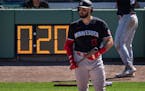 Minnesota Twins left fielder Joey Gallo (13) with a runner on base waited to bat with 20 seconds in the clock Monday ,Feb .27,2023 in Fort Myers, Fla.