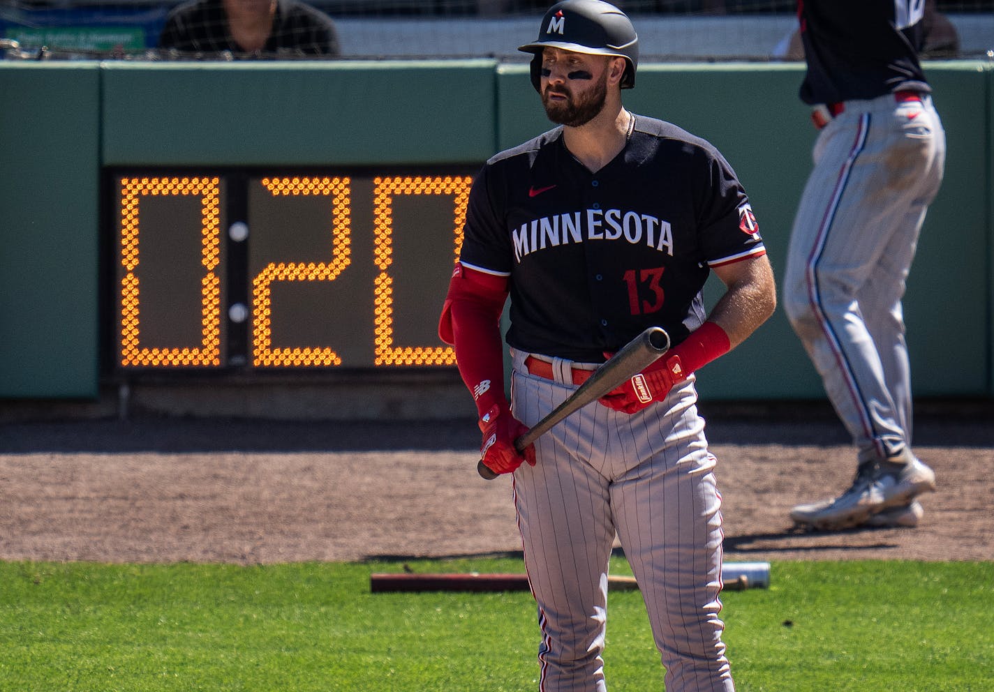 Minnesota Twins left fielder Joey Gallo (13) with a runner on base waited to bat with 20 seconds in the clock Monday ,Feb .27,2023 in Fort Myers, Fla. ] JERRY HOLT • jerry.holt@startribune.com