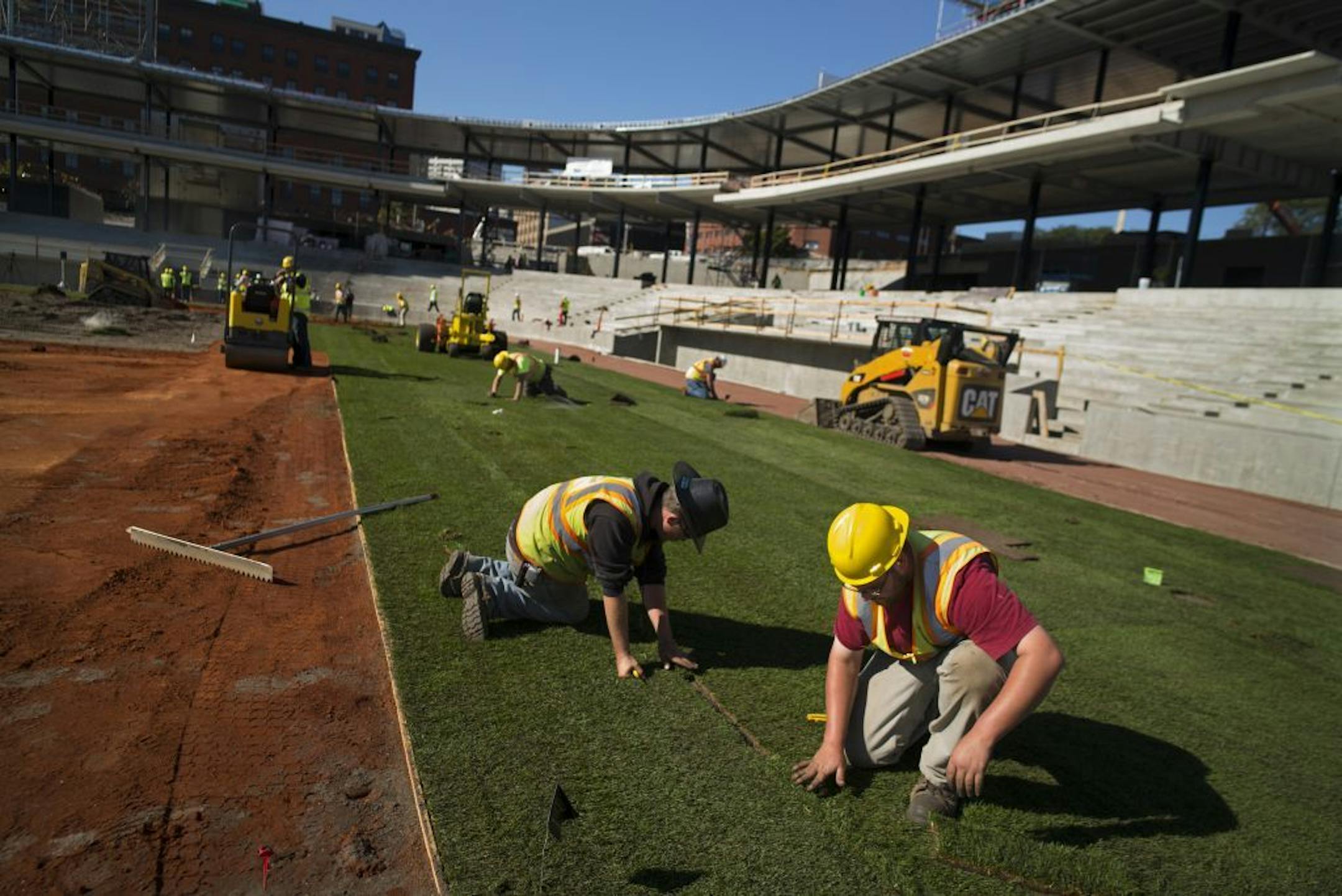 Crews will begin installing 95,000 square feet of specialized sod for the playing field at CHS Field on Wednesday, October 8. Mayor Chris Coleman and the St. Paul Saints mascot Mudonna were present