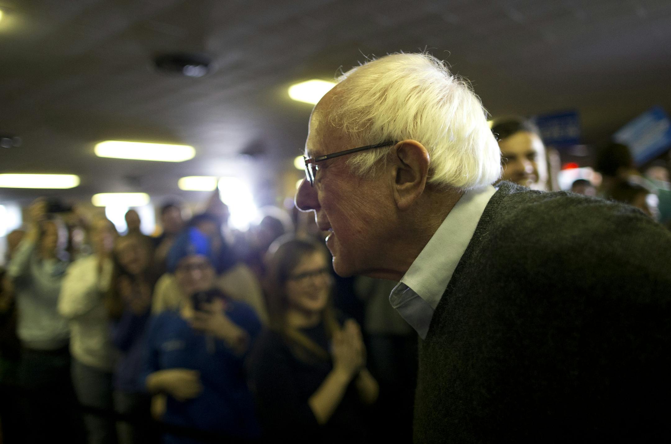 Democratic presidential candidate Sen. Bernie Sanders, I-Vt., walks towards the podium at a campaign event, Saturday, Jan. 23, 2016, in Clinton, Iowa. (AP Photo/Jae C. Hong)