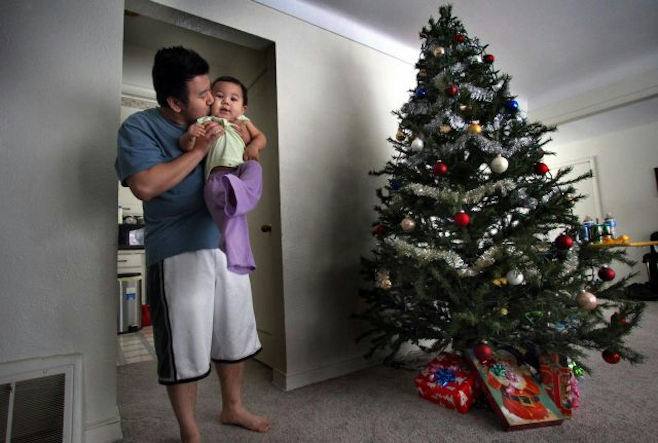 Thursday morning was all hugs, kisses, joy and relief. Eleven-month-old Ayden Hoang was in the back seat of a car that was stolen Wednesday evening. He was found unharmed about 7 miles away. Here he got a kiss from his dad, Duy Hoang.