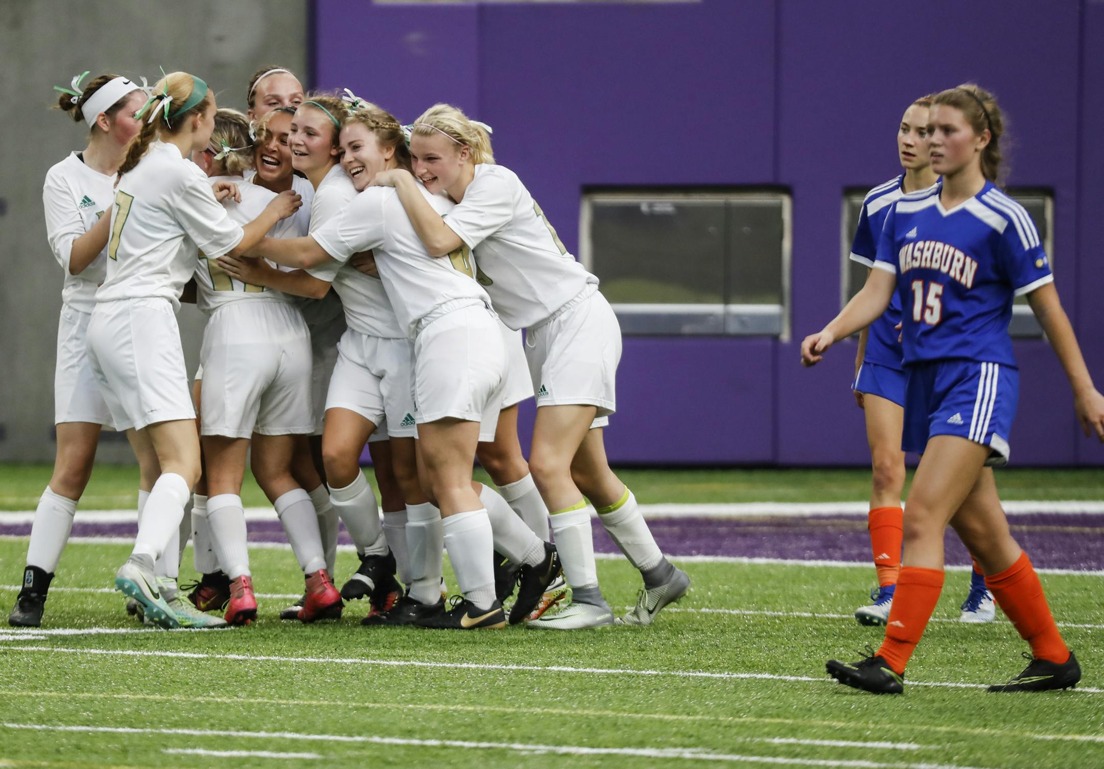Teammates celebrated with Jadyn Scholler after her game winning goal in the last nine minutes of the second half of the girls AA semifinals. ] RENEE JONES SCHNEIDER • renee.jones@startribune.com Class 2A girls' soccer state semifinals between Minneapolis Washburn and Rosemount on Tuesday, November 1, 2016, at U.S. Bank Stadium in Minneapolis, Minn. Rosemount won 2-1.