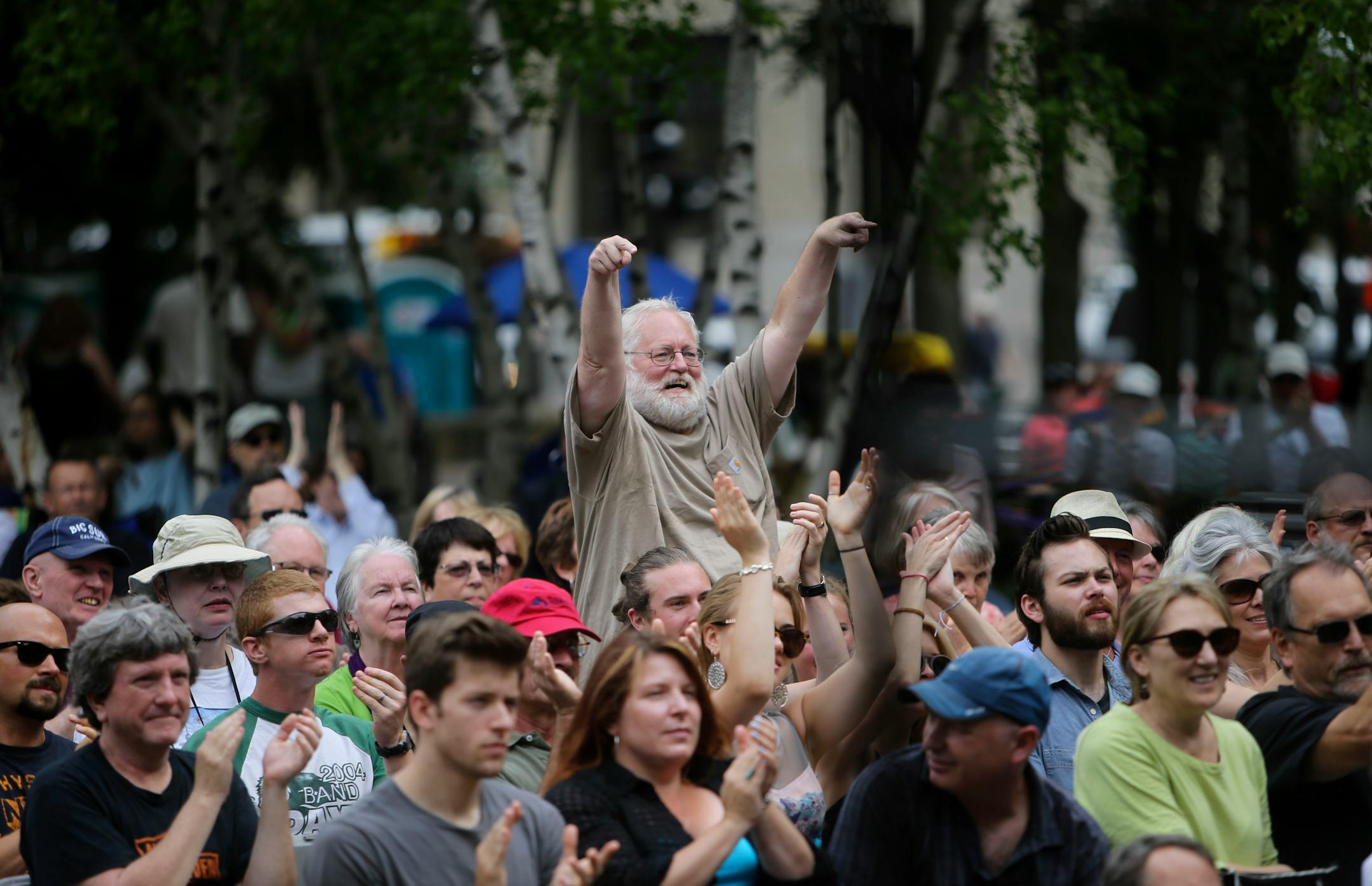 Jazz fan Mark Trucker of Minneapolis showed some love for Red Planet as their wrapped up their set at the St. Paul Jazz Fest Friday, June 27, 2014, in Mears Park in St. Paul, MN.] (DAVID JOLES/STARTRIBUNE) djoles@startribune St. Paul Jazz Fest Friday, June 27, 2014at Mears Park in St. Paul, MN.