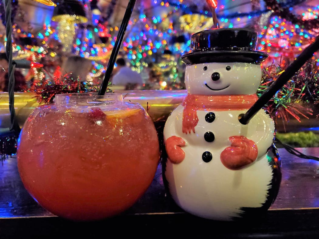 'Punch in the Boob from Drunk Uncle Glen' (left) and 'Snowball to the Face' are two of the holiday cocktails at Mary's Christmas Palace.