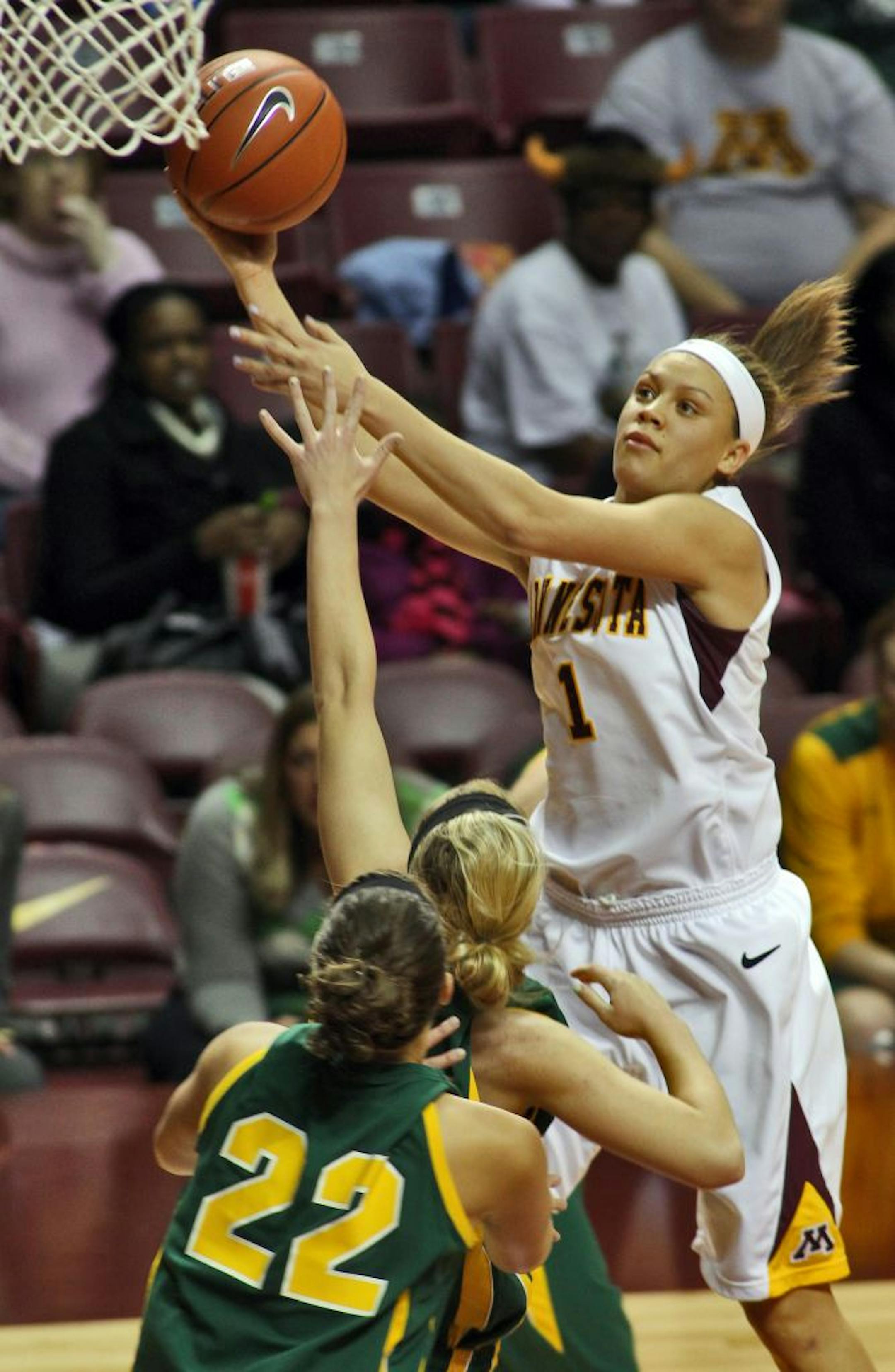 Womens College BAsketball Subway Classic. Minnesota Gophers vs. North Dakota State (NDS) Bison. Minnesota's Rachel Banham drove to the basket for a layup.