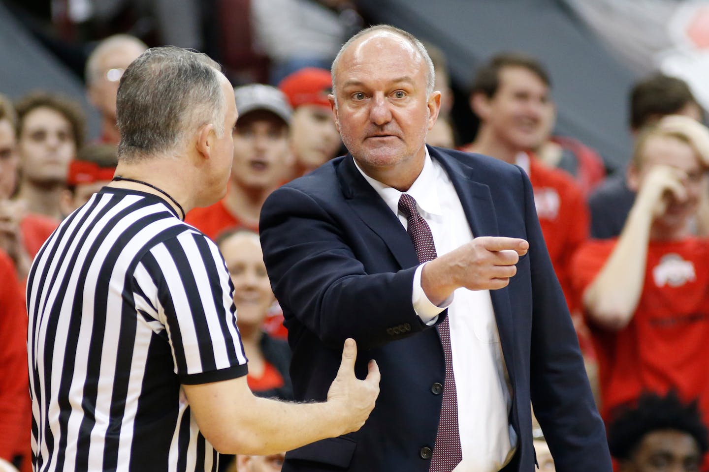 Ohio State coach Thad Matta talks with a referee during their NCAA college basketball game against Wisconsin Thursday, Feb. 23, 2017, in Columbus, Ohio. Matta stepped down on Monday.