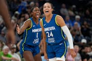 Lynx forward Napheesa Collier, right, celebrates with guard Diamond Miller (1) after making a basket during a game against the Seattle Storm on June 2