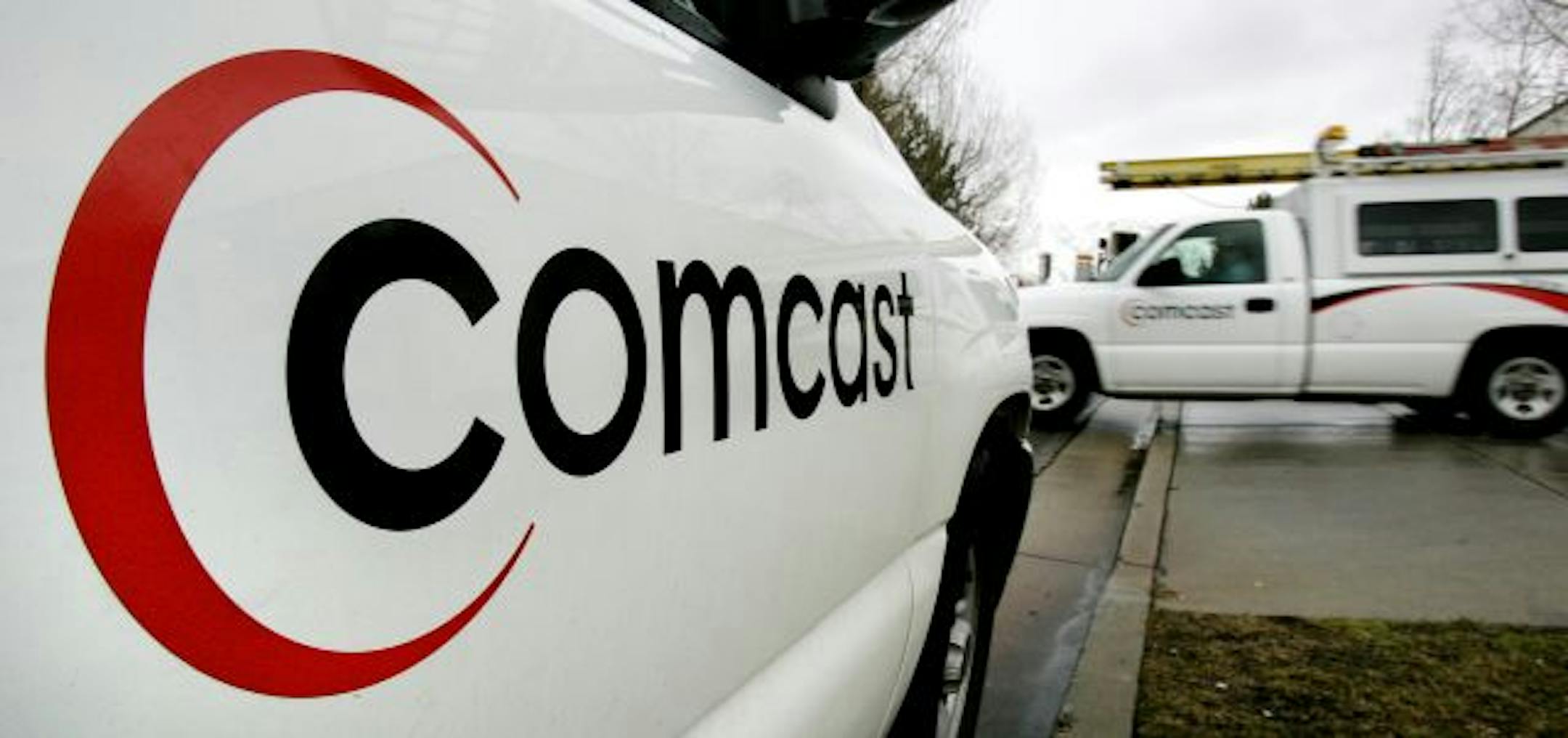 A technician for Comcast Corp. heads out on a job.