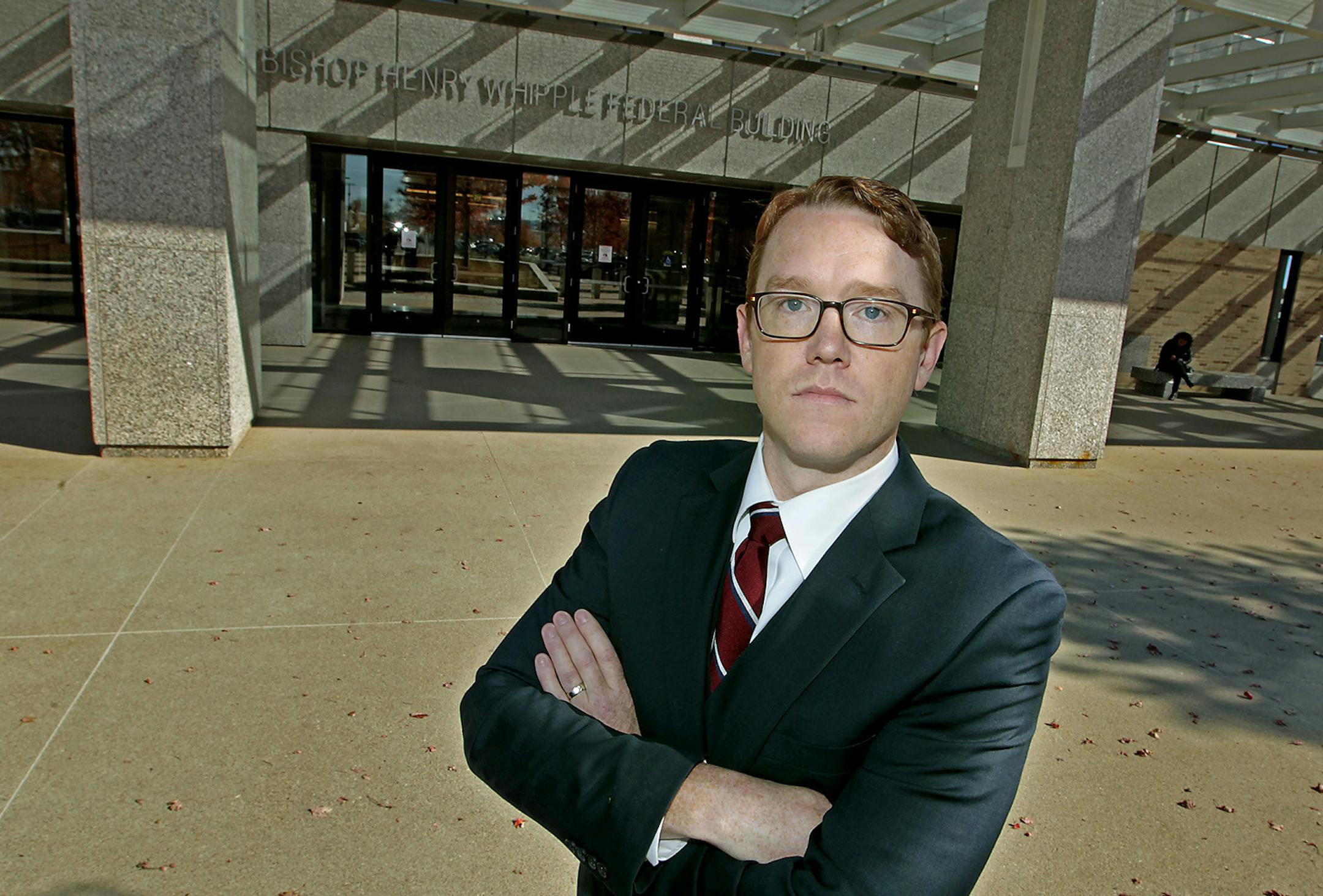 Attorney Kevin Heinz stood in front of the Bishop Henry Whipple Federal Building after attending court, Wednesday, October 15, 2014 in Bloomington, MN. . Earlier this year, 240 unaccompanied children from Central America were placed in Minnesota with relatives or other sponsors. Now, the children's cases are making their way through the local immigration court - fast. The court is tackling these cases on an expedited docket as a partnership of nonprofits, law schools and private firms scrambles