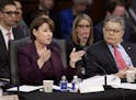 Sens. Amy Klobuchar and Al Franken question the Republican side as the Senate Judiciary Committee discusses the nomination of Supreme Court nominee Ne