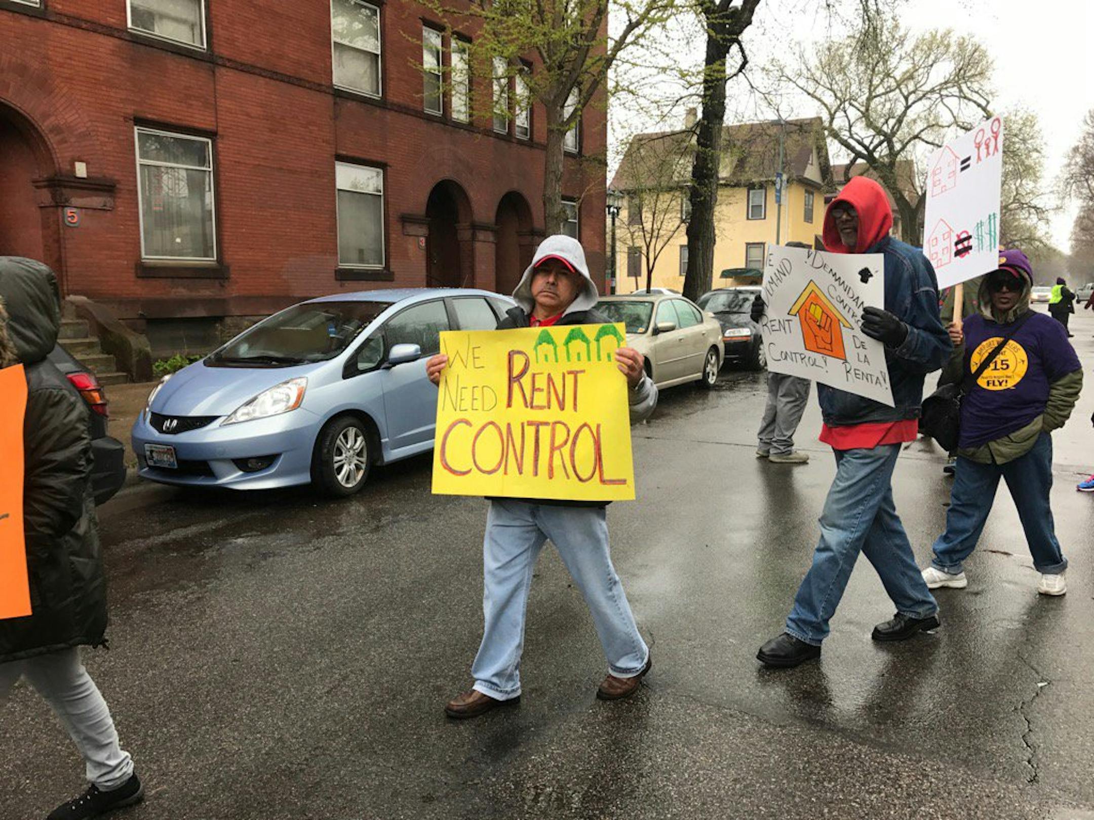 People rallied outside the Apartment Shop, the company of landlord Stephen Frenz, in south Minneapolis on Monday. They were protesting what they contend are "unsanitary and unsafe housing."