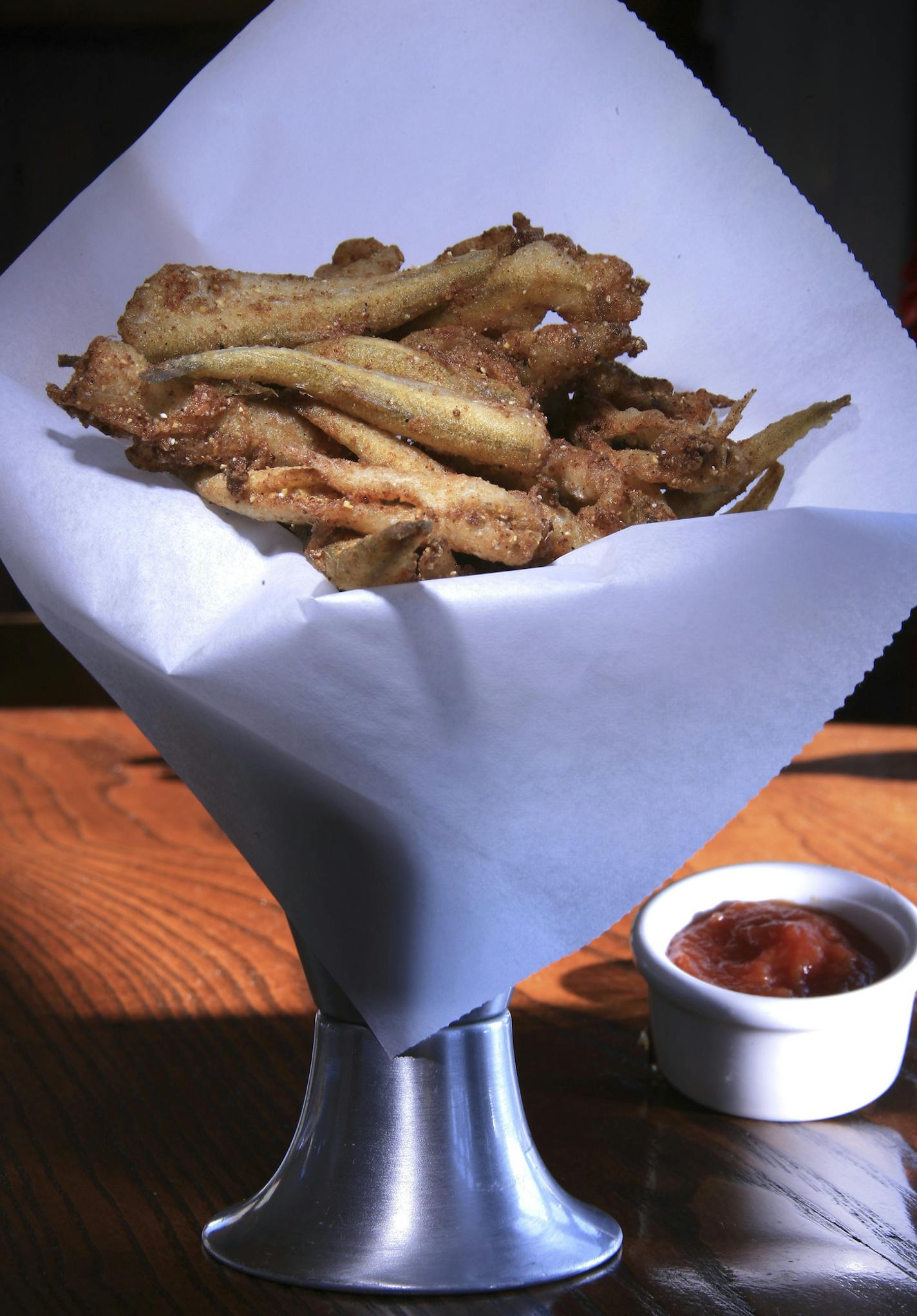 Steve Rice &#xef; srice@startribune.com Minneapolis, 02/21/2008] Smelt fries are served with smoked tomoto ketchup and a sweet onion tartar sauce (not shown).