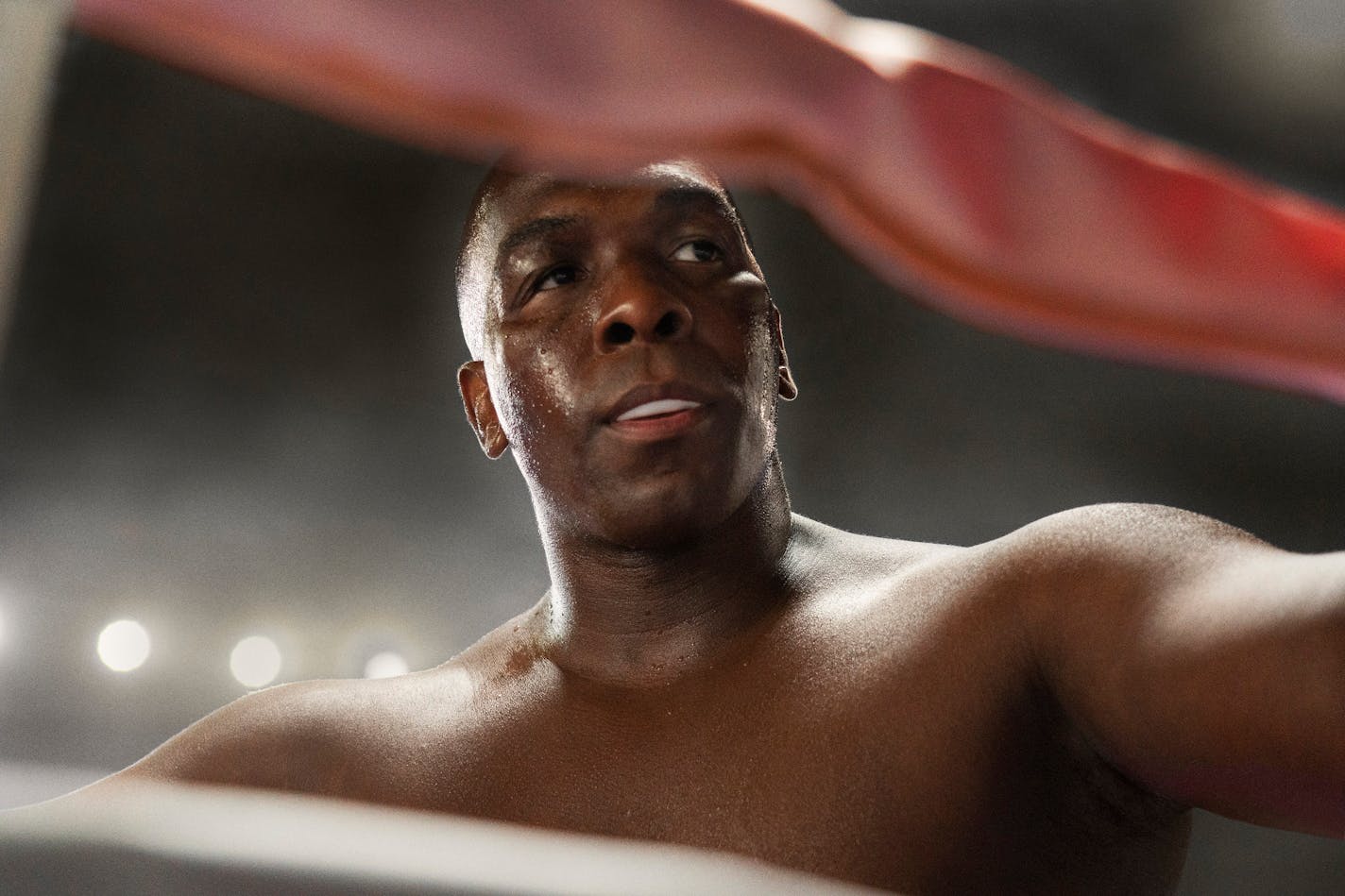 Khris Davis stars as George Foreman in "Big George Foreman: The Miraculous Story of the Once and Future Heavyweight Champion of the World." (Alan Markfield/Sony Pictures/TNS)