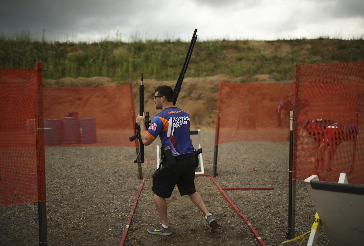 Paul Wollmuth walked through the target sequence of one of the 3 gun competition problems to familiarize himself with it before tackling it with live ammo Wednesday night. ] JEFF WHEELER &#x2022; jeff.wheeler@startribune.com The Forest Lake Sportsmen's Club runs a league for a relatively new discipline of competitive shooting known as 3 gun. Participants solve a variety of target problems with either a pistol, shotgun, or rifle. The league competition was Wednesday night, June 15, 2016 in Forest