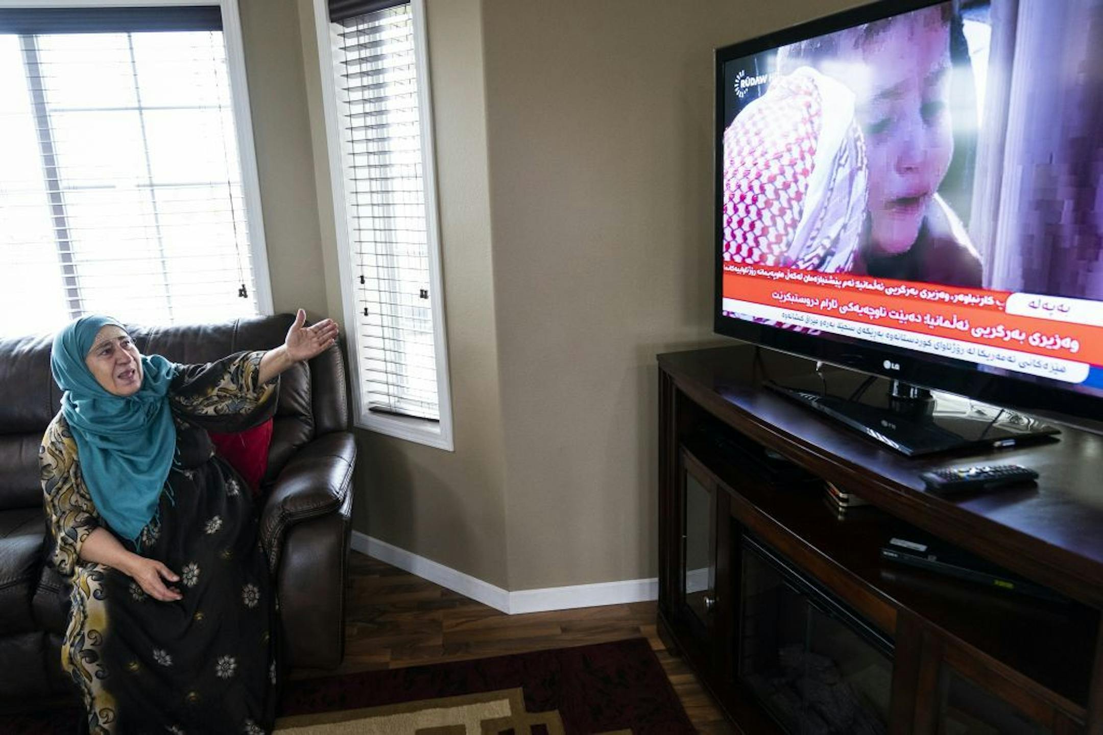 Fatima Osman, a Kurdish refugee from Iraq who came to Minnesota in the early 1990s, got upset while watching news from the current events in Syria on the Kurdish news network Rudaw.