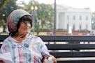 FILE - In this Sept. 12, 2013 file photo, Concepcion Picciotto, who held a constant peace vigil in Lafayette Park across from the White House, sits on