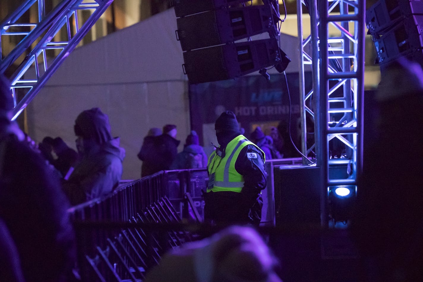 A security guard stood in front of the stage at the Super Bowl Live events on Friday night, February 2, 2018, on Nicollet Mall in Minneapolis, Minn.