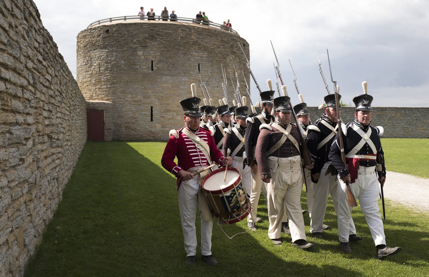 Redactors of the 5th Infantry Division marched to lower the flag during the summer opening season at Historic Fort Snelling Sunday May 28, 2017 in St. Paul, MN.