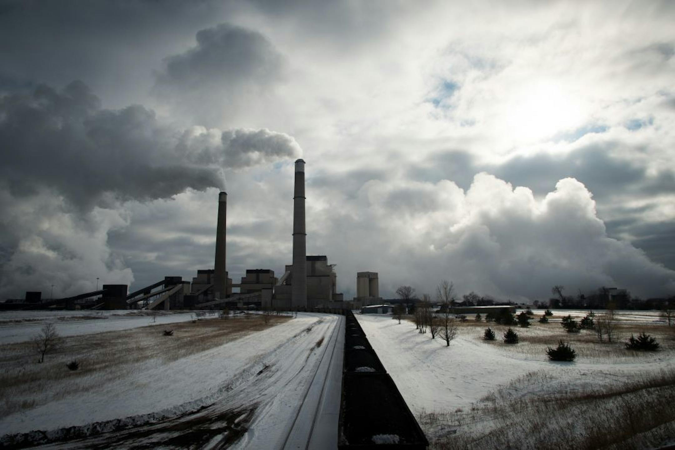 A coal train is idle on the tracks leading to the Sherburne County Generating Station on Wednesday afternoon in Becker.