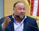 FILE - Conspiracy theorist Alex Jones takes the witness stand to testify at the Sandy Hook defamation damages trial at Connecticut Superior Court in W