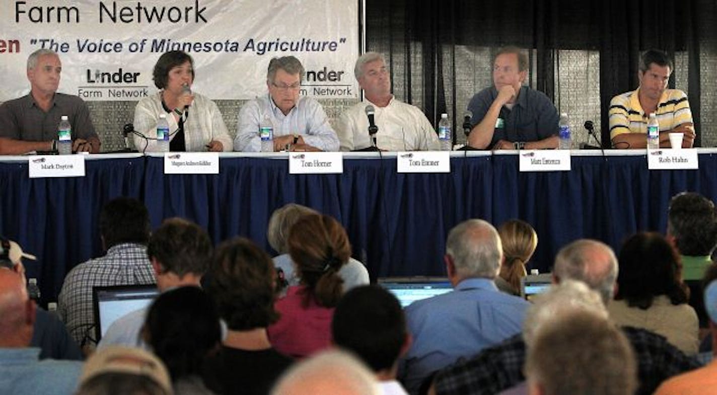 Voters listened to gubernatorial candidates from the DFL, Republican and Independence Parties as they participated in a debate at FarmFest in Morgan. Candidates included: (seated l to r) Mark Dayton (D), Margaret Anderson Kelliher (D), Tom Horner (I), Republican Tom Emmer, Matt Entenza (D) and Rob Hahn (I).