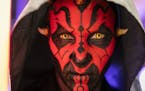 Amber Rae of Edina, who was dressed as Darth Maul, posed for a photo. Rae was part of Minnesota Force, a local Star Wars fan group that does charity c