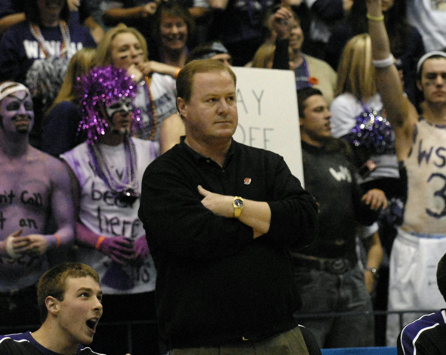 Winona State head coach Mike Leaf, standing front, along with fans and bench players, take in the team's lead and eventual win over Bentley, 86-75, in an NCAA Division II semifinal college basketball game in Springfield, Mass., Thursday, March 27, 2008. Winona State meets Augusta State in the final on Saturday. (AP Photo/Nancy Palmieri ORG XMIT: MANP112