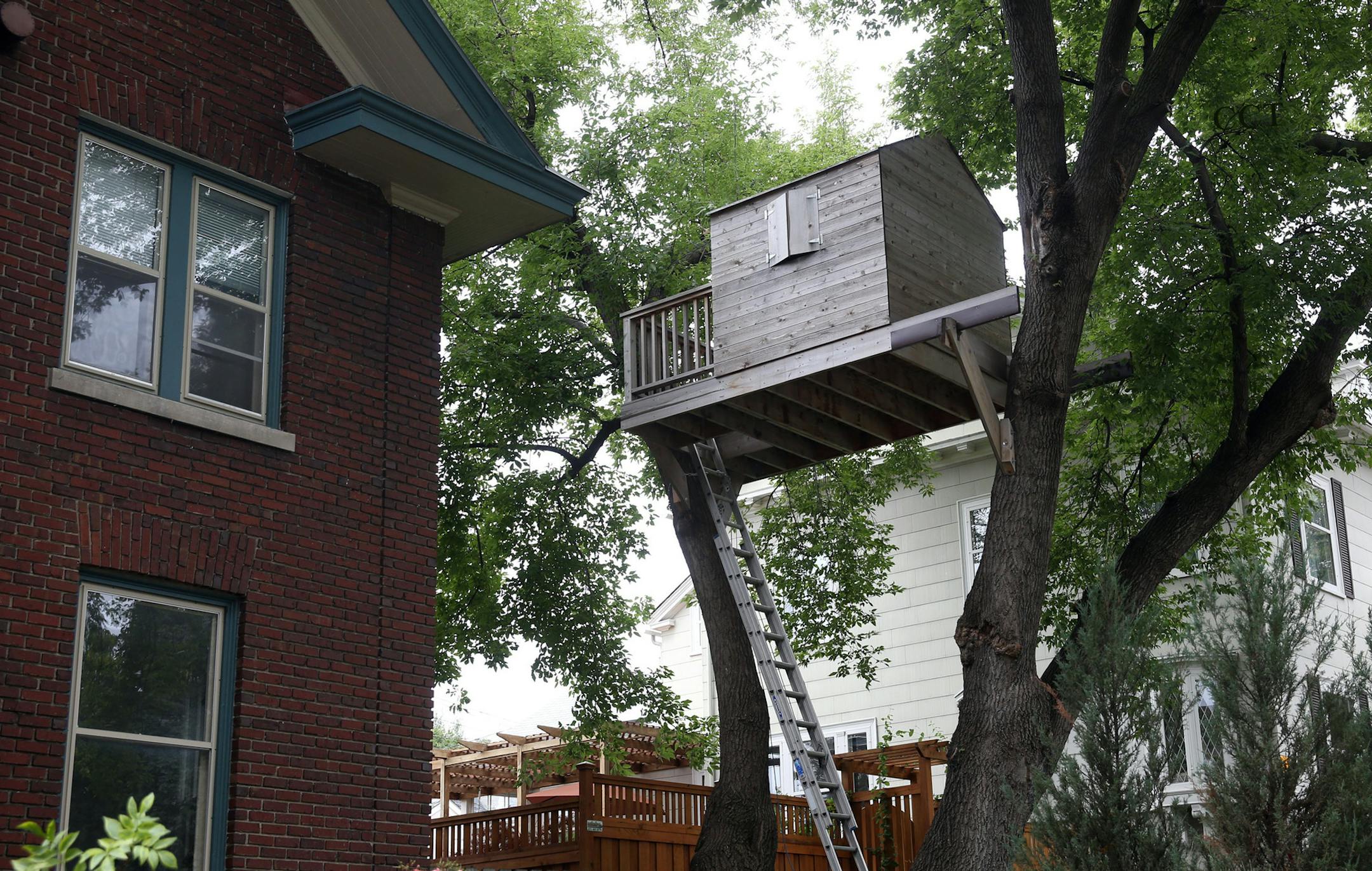 The city wants a treehouse built by Clem Pryke for his teenage son to be torn down, but he's appealing for a hearing Thursday. Tree houses don‚Äôt require building permits, but they must abide by setbacks and height limit. The city measures the Lowry Hill tree house as too tall, and extending 15 inches into the neighbor's yard. It's also 10-1/2 feet from the bedroom window of a neighbor who complained two years ago. ] JIM GEHRZ ‚Ä¢ jgehrz@startribune.com / Minne