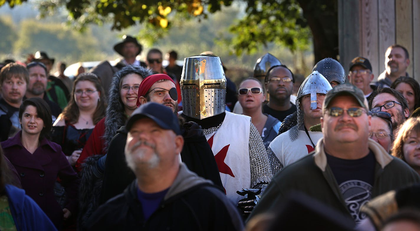 A large crowd gathered outside the King&#x201a;&#xc4;&#xf4;s Gate, at the Renaissance Festival, prior to the start of a new day. ] JIM GEHRZ &#x201a;&#xc4;&#xa2; jgehrz@startribune.com / Shakopee, MN / Sept. 13, 2014 / 8:30 AM / BACKGROUND INFORMATION: For decades the Renaissance Festival has been trying to maintain an illusion of a return to a distant medieval past. But recent patrons report that the illusion is under strain, as a very modern-day enterprise, sand mining for oil fracking, is vis