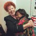 Sandra Hilary had an enthusiastic hug for Minneapolis Mayor Sharon Sayles Belton after an election victory.