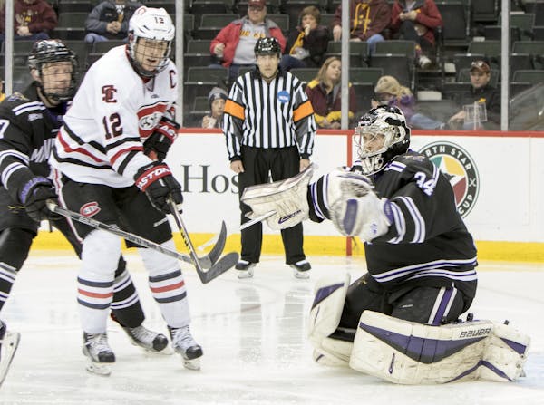 St. Cloud State Huskies defenseman Ethan Prow (12) cannot pull the trigger as the St. Cloud State Huskies faced off against the Minnesota State Univer