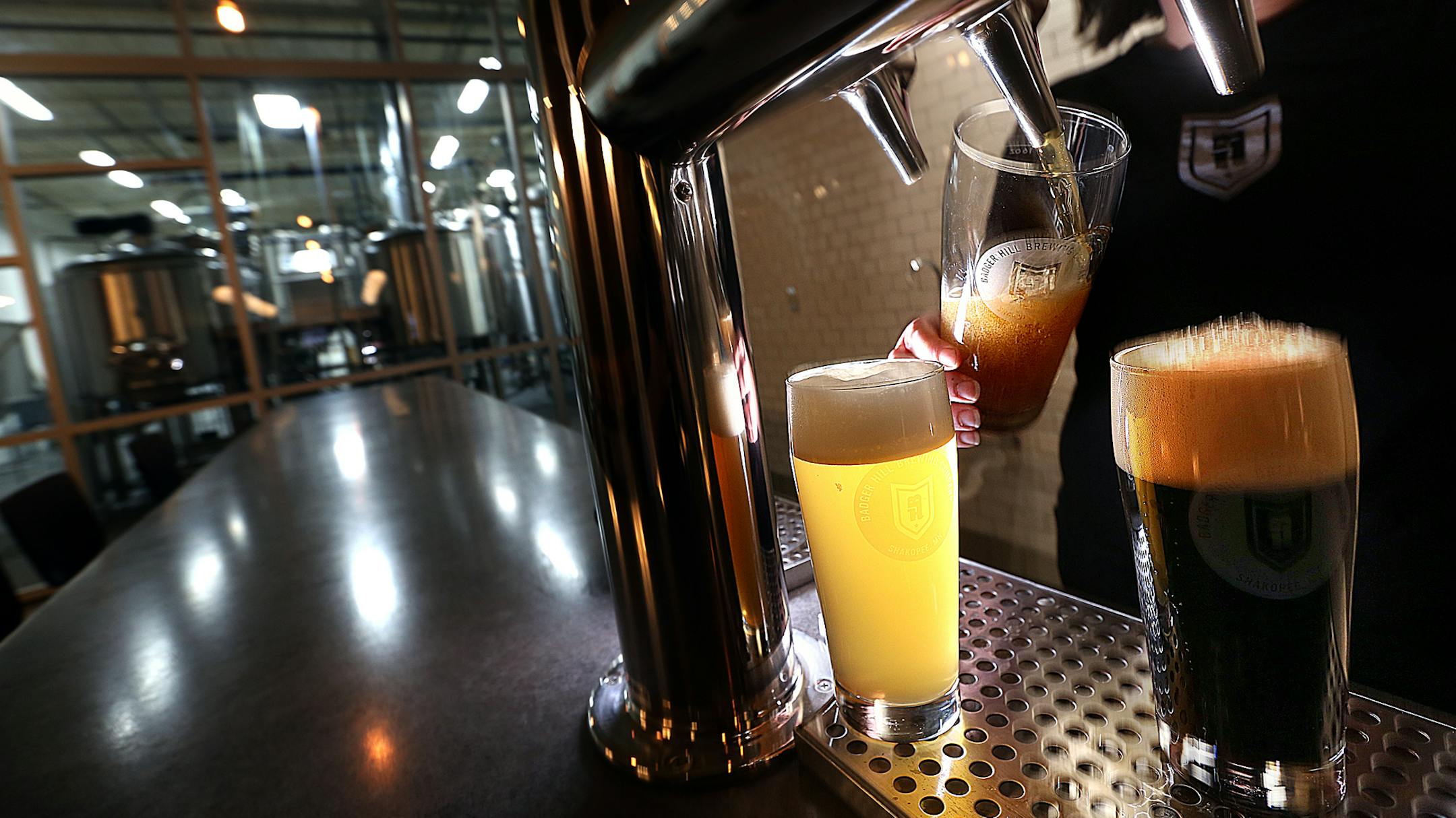 The Badger Hill Brewing Company taproom is nearing completion. Brews on tap include: White IPA (a gold medal winner); High Road Everyday Ale; and Fountain Stout. ] JIM GEHRZ ‚Ä¢ james.gehrz@startribune.com / Shakopee, MN / December 11 2014 /11:00 AM - BACKGROUND INFORMATION: When Brittany Krekelberg and her husband were first dating, they toured Summit Brewing Company together. Both craft beer enthusiasts, they're now opening a taproom of their own. Badger Hill Brewing, which ha