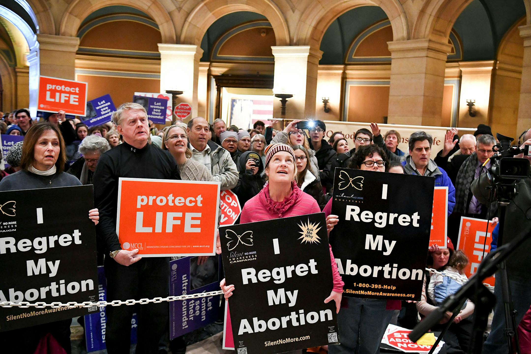 Over one thousand people showed up from around Minnesota as Minnesota Citizens Concerned for Life held a March on the State Capitol commemorating the 45th anniversary of the Roe v. Wade decision. The March for Life had to be moved from the Capitol steps to inside and heavy snow moved through the Twin Cities.