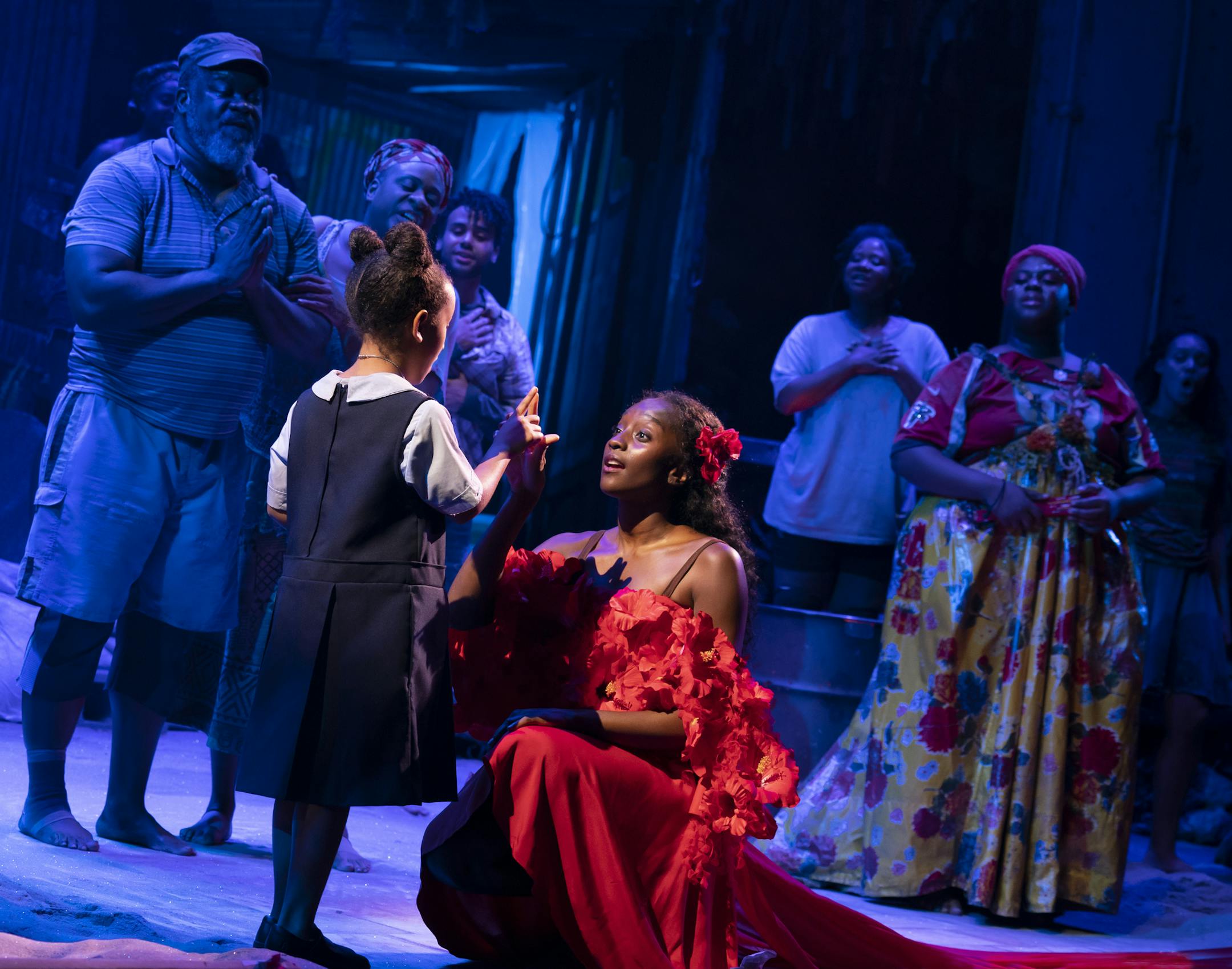 MiMi Crossland as Little Girl, Courtnee Carter as Ti Moune, and the Company of the North American Tour of Once On This Island. Photo by Joan Marcus.