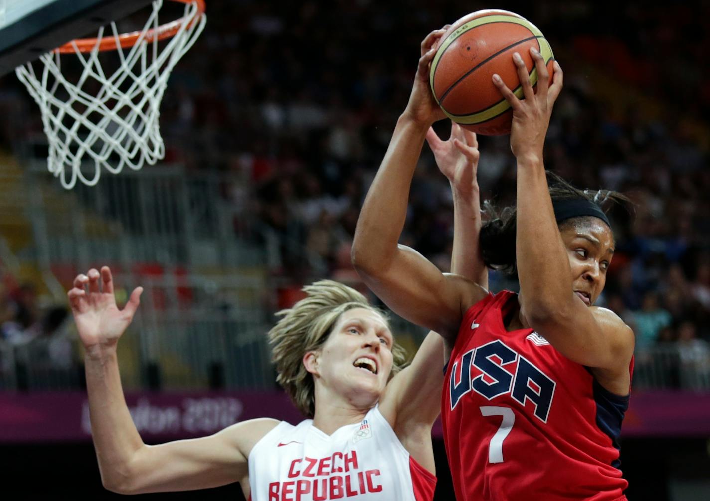 USA's Maya Moore, right, during the 2012 Olympics.