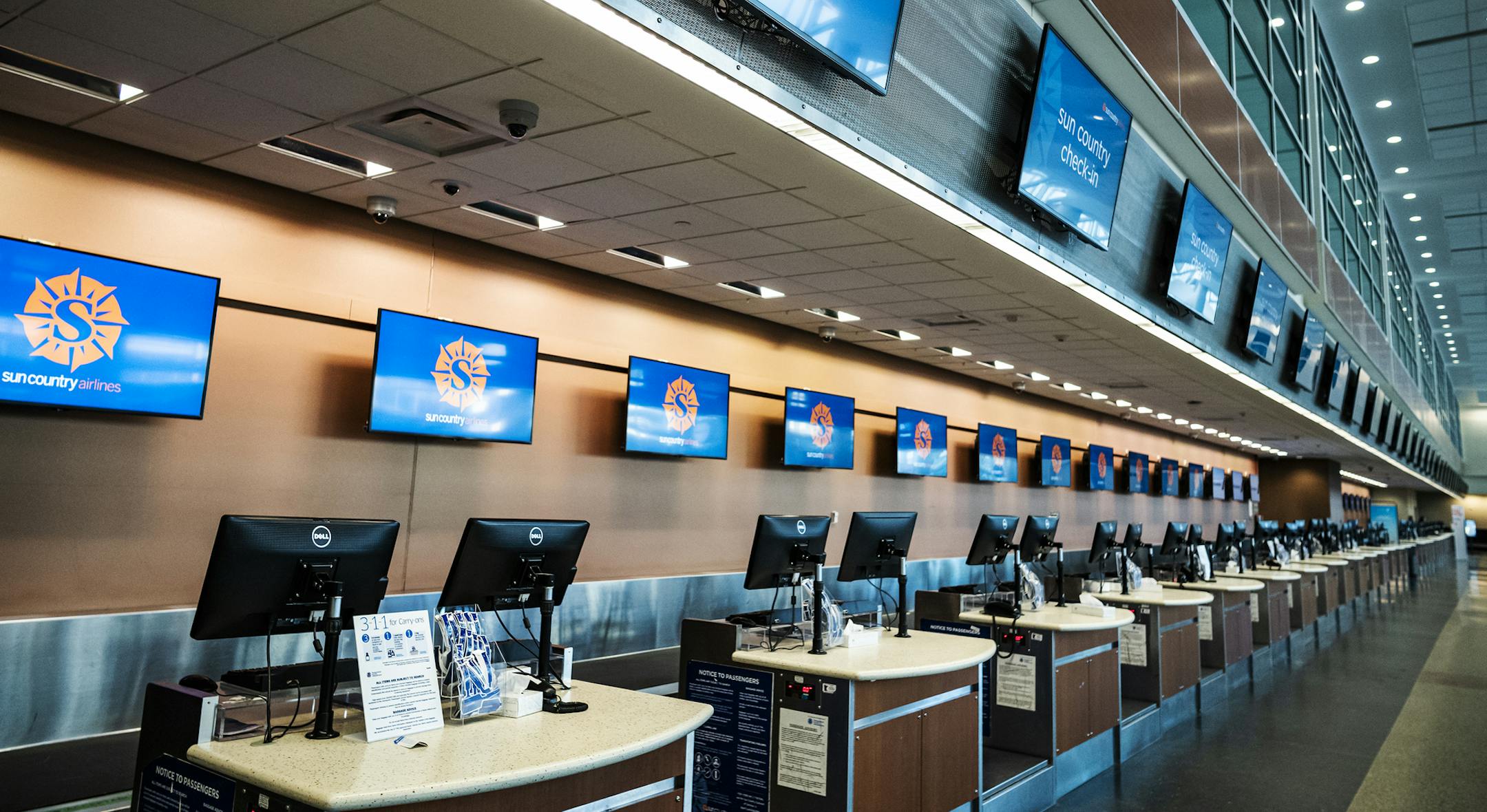 Through at least mid-June, Sun Country will pare its flight schedule to six a week from Minneapolis-St. Paul International Airport. File photo of the airline's check-in desk in Terminal 2 in late March.