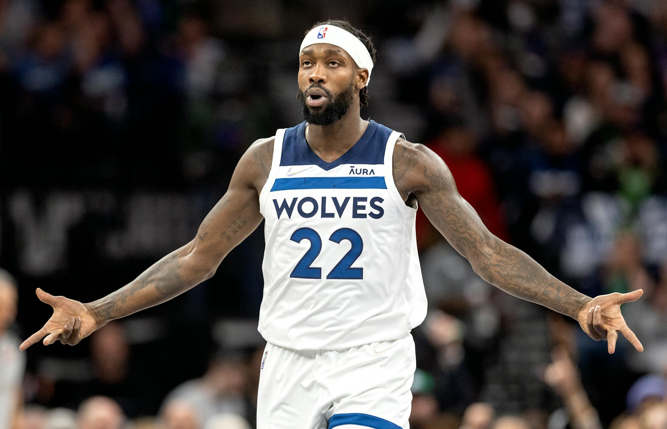 Patrick Beverley (22) of the Minnesota Timberwolves celebrates a three pointer in the first quarter.