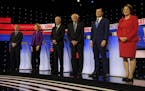 Democratic presidential candidates during the debate at Drake University in Des Moines, Iowa, Jan. 14, 2020. From left: Tom Steyer; Sen. Elizabeth War