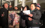 ChaMee Vue tearfully addressed relatives and friends during a candlelight vigil outside her family’s home on Dec. 17, 2019, held in honor of her fat