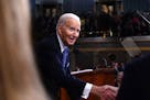 President Joe Biden shakes hands after delivering the State of the Union address on Thursday.