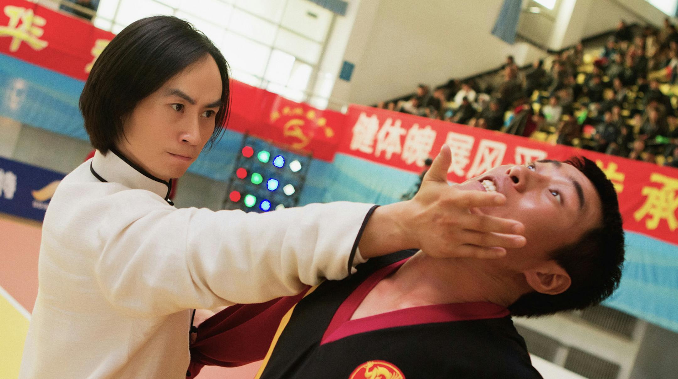 Chen Hu (left) puts the moves on a martial arts opponent in Keanu Reevesís ìMan of Tai Chi.î