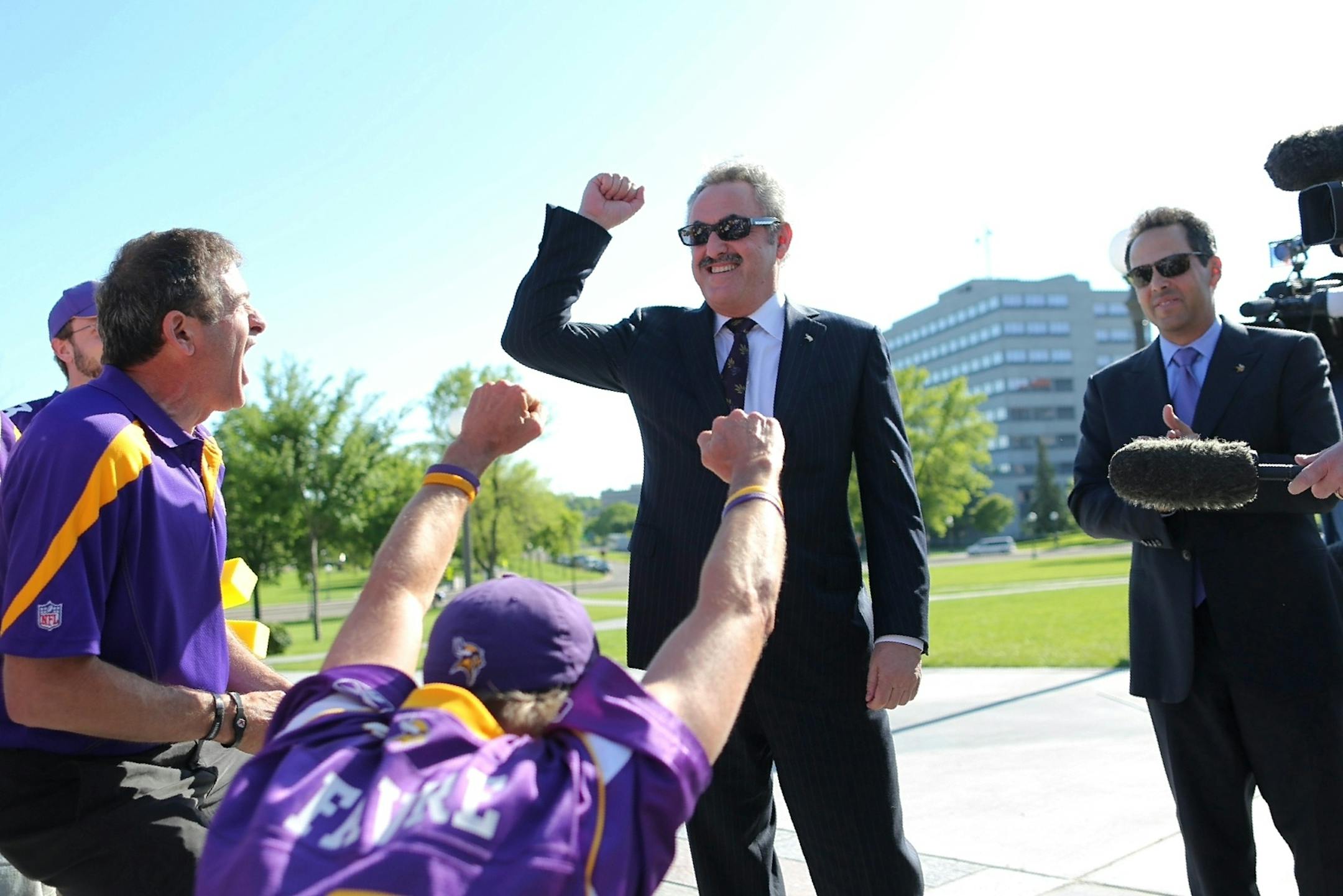 Vikings owner Zygi and Mark Wilf greeted Vikings fans outside the Capitol before a press conference after the stadium was passed in the Senate and House on May 10, 2012 at the State Capitol.