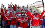 Capitals captain Alex Ovechkin held up the Stanley Cup during a victory rally on the National Mall in Washington last June.