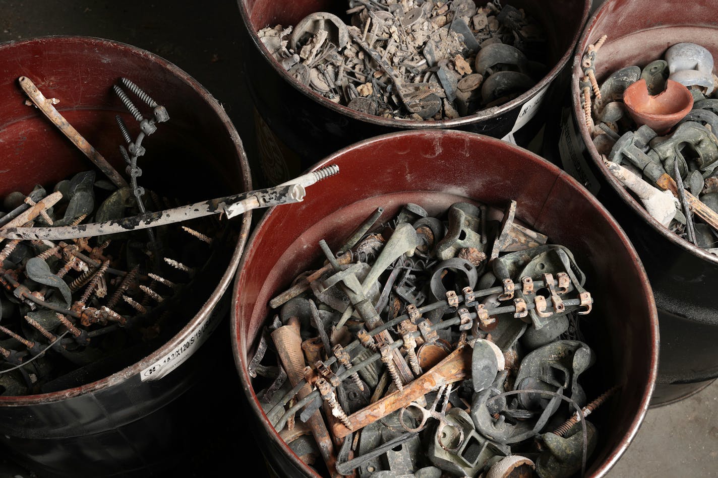 Bins of medical items from cremated individuals sit at Paul Maher's Cremation &amp; Trade Services Inc. facility Wednesday, Dec. 6, 2023 in St. Paul, Minn. Maher collects all metal and non metal items that don't burn in the process and sends them to a recycler. ] ANTHONY SOUFFLE • anthony.souffle@startribune.com