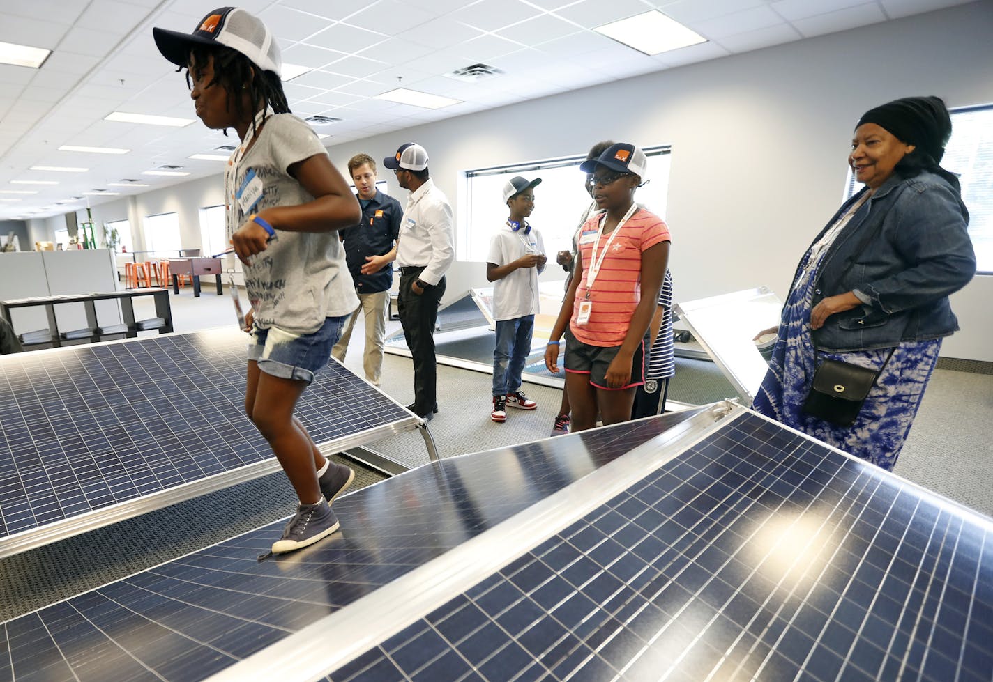 Maniya Dorsey, 9, toured Ten K Solar in Bloomington with the first "Just-B-Solar Camp" held at Shiloh Temple.