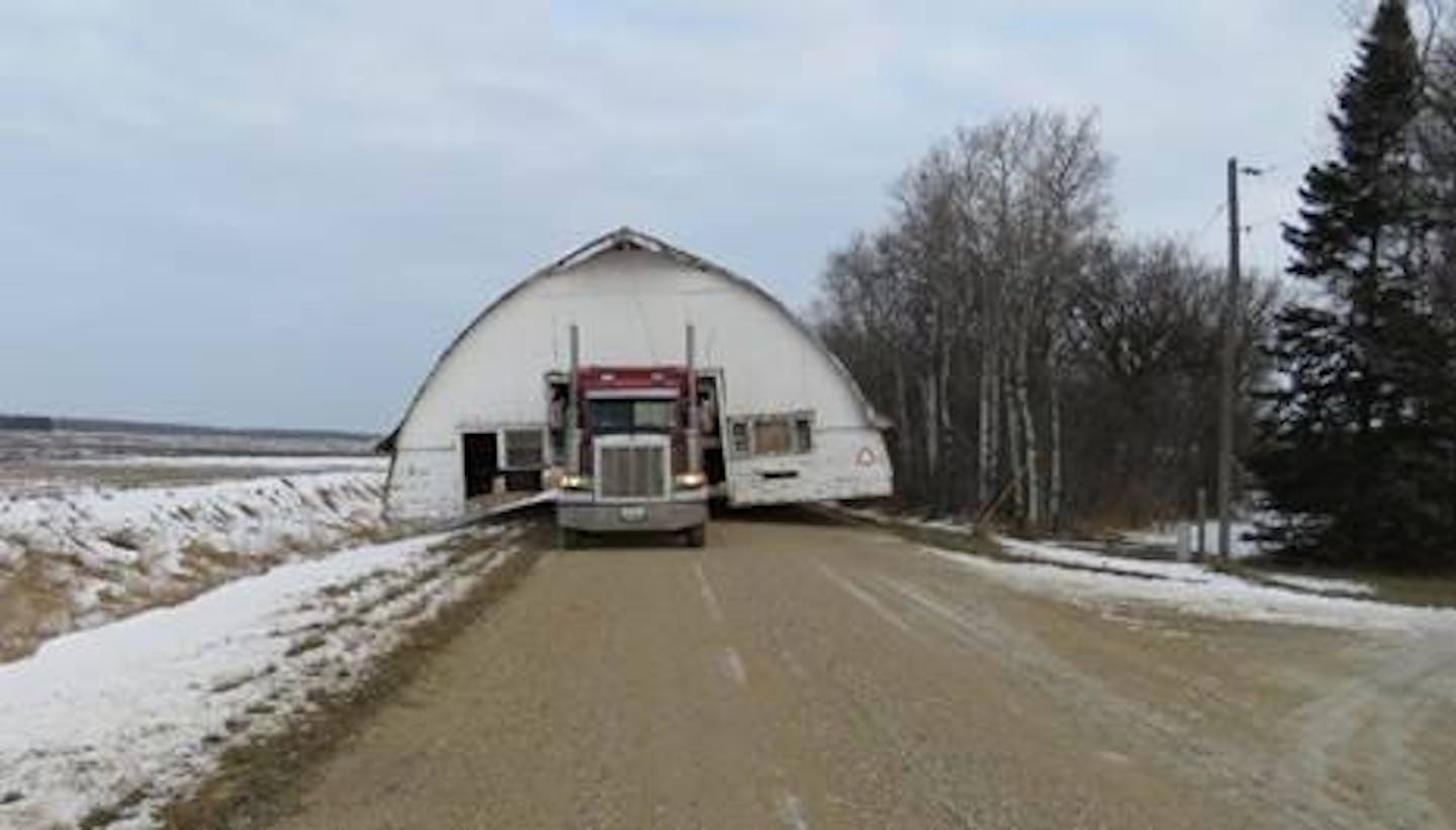 A truck driver was cited for failing to have proper permits to haul a 36-foot wide shed in northwestern Minnesota.