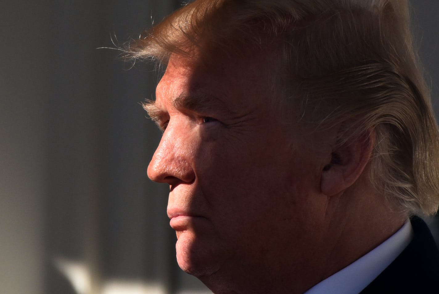 U.S. President Donald Trump listens to Vice President Mike Pence before addressing March for Life Participants and Pro-Life Leaders in the Rose Garden of the White House Jan. 19, 2018 in Washington, D.C. (Olivier Douliery/Abaca Press/TNS)