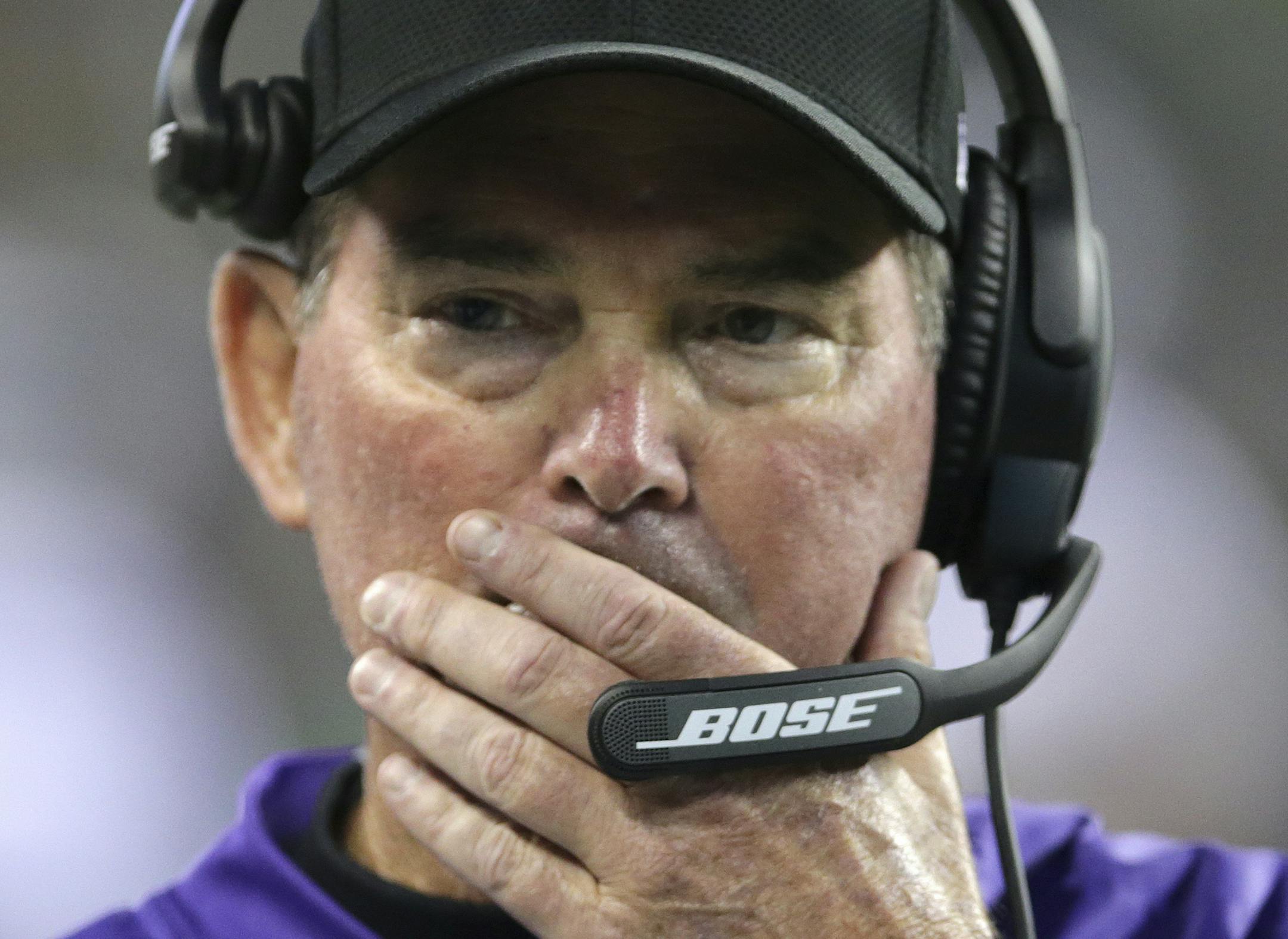 Minnesota Vikings coach Mike Zimmer walks on the sideline during the first half of tehe team's NFL football preseason game against the Seattle Seahawks, Friday, Aug. 18, 2017, in Seattle. (AP Photo/Scott Eklund)